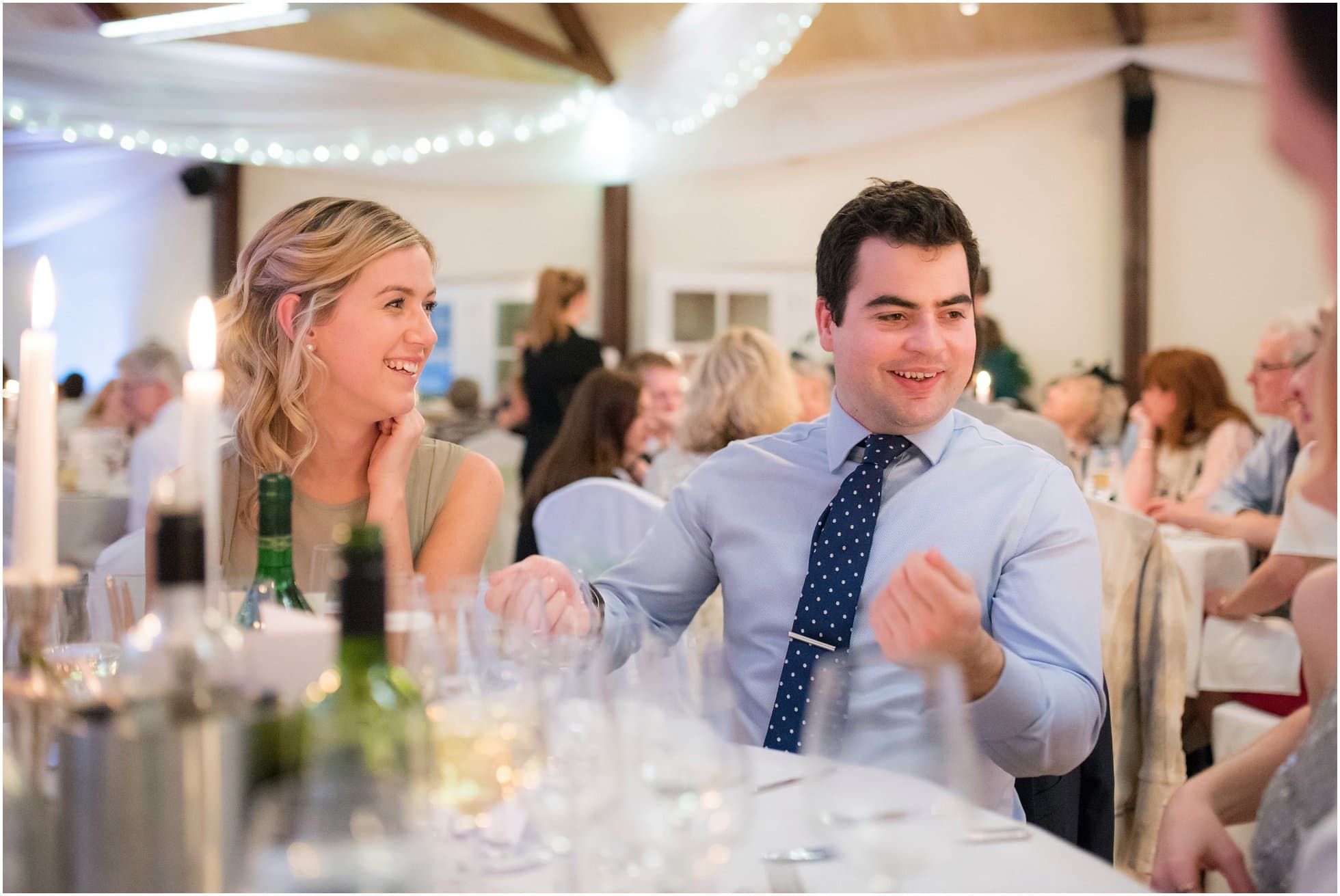 Guests having a laugh at the wedding breakfast