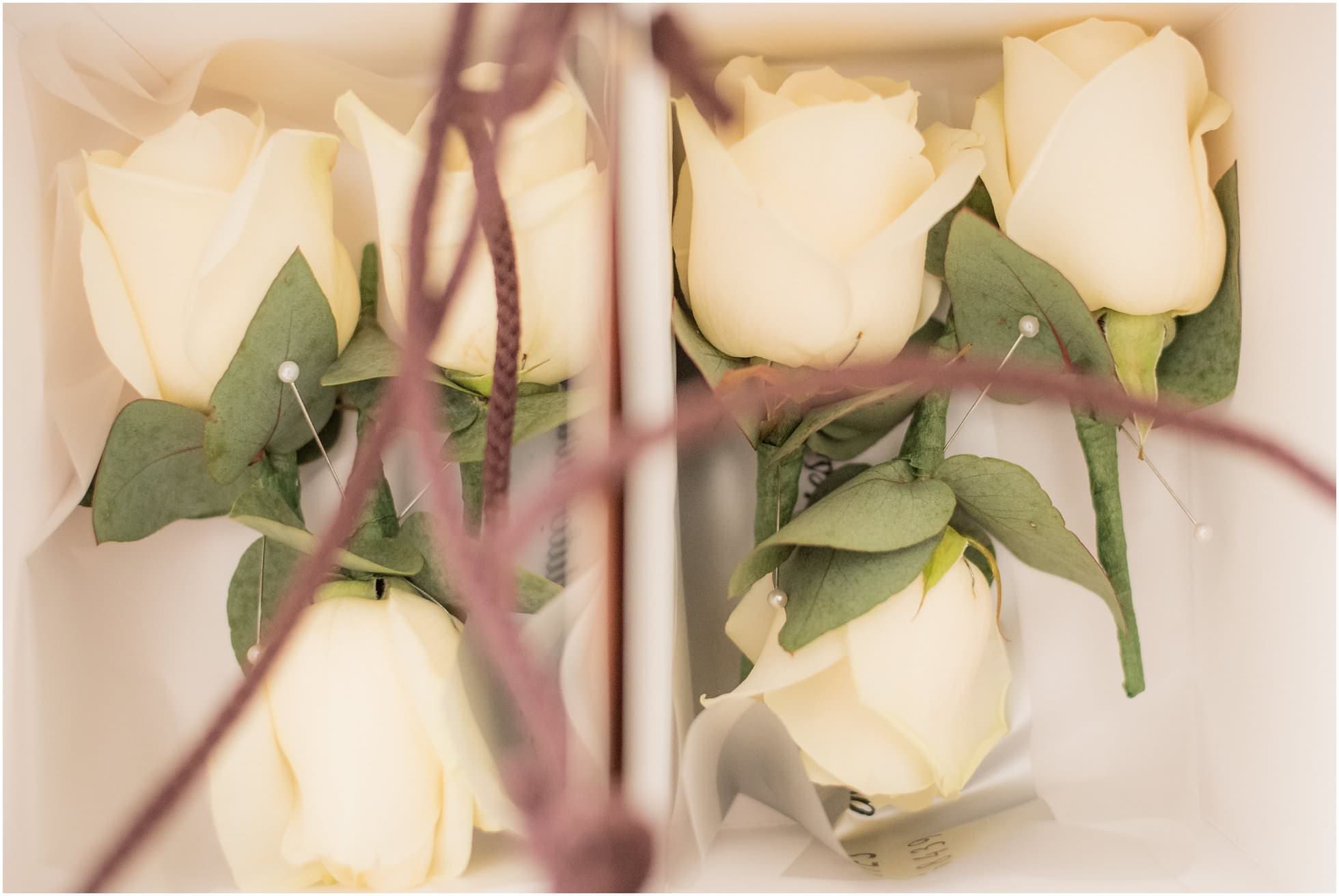 White rose buttonholes