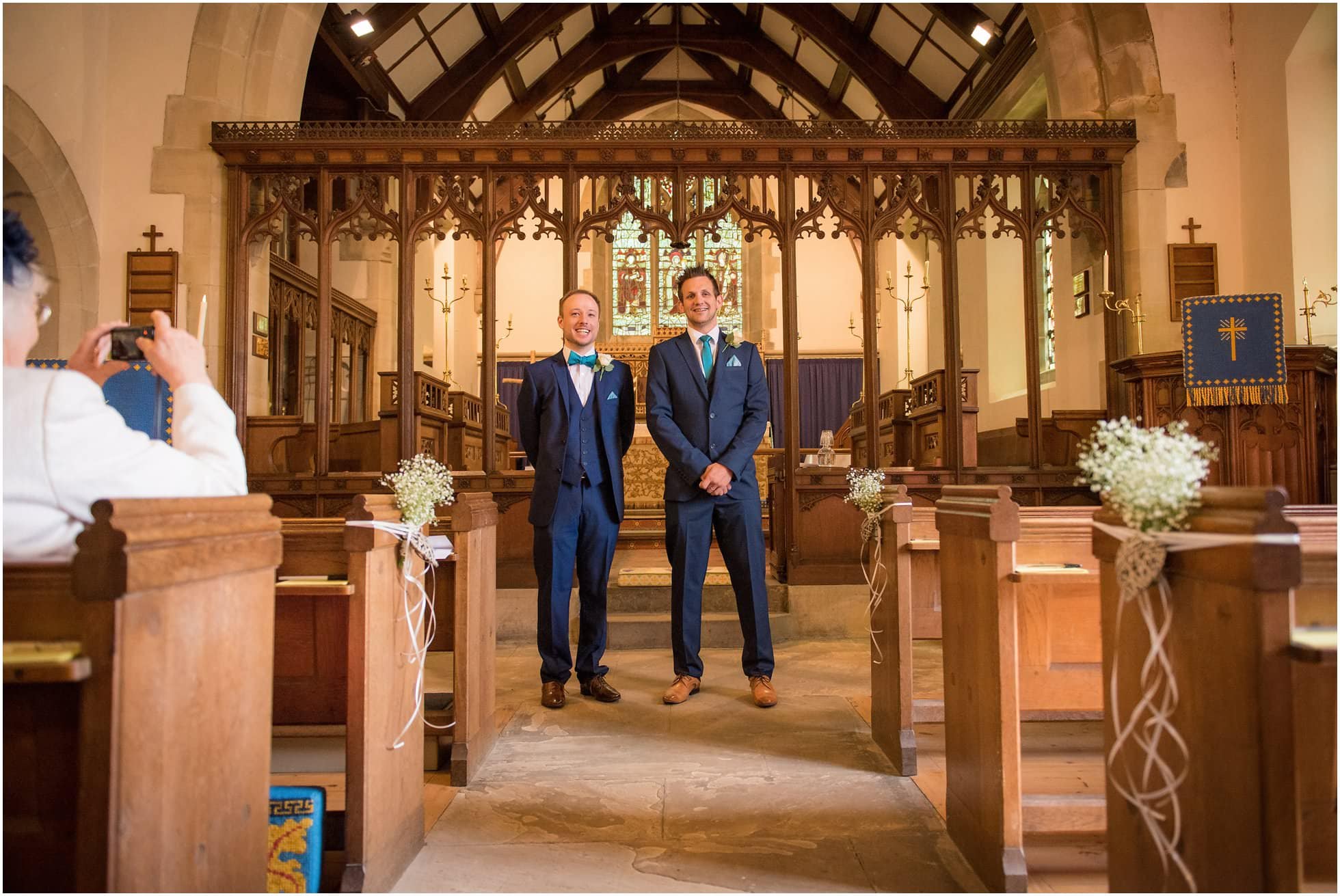 Groom and bestman wait for the stunning bride