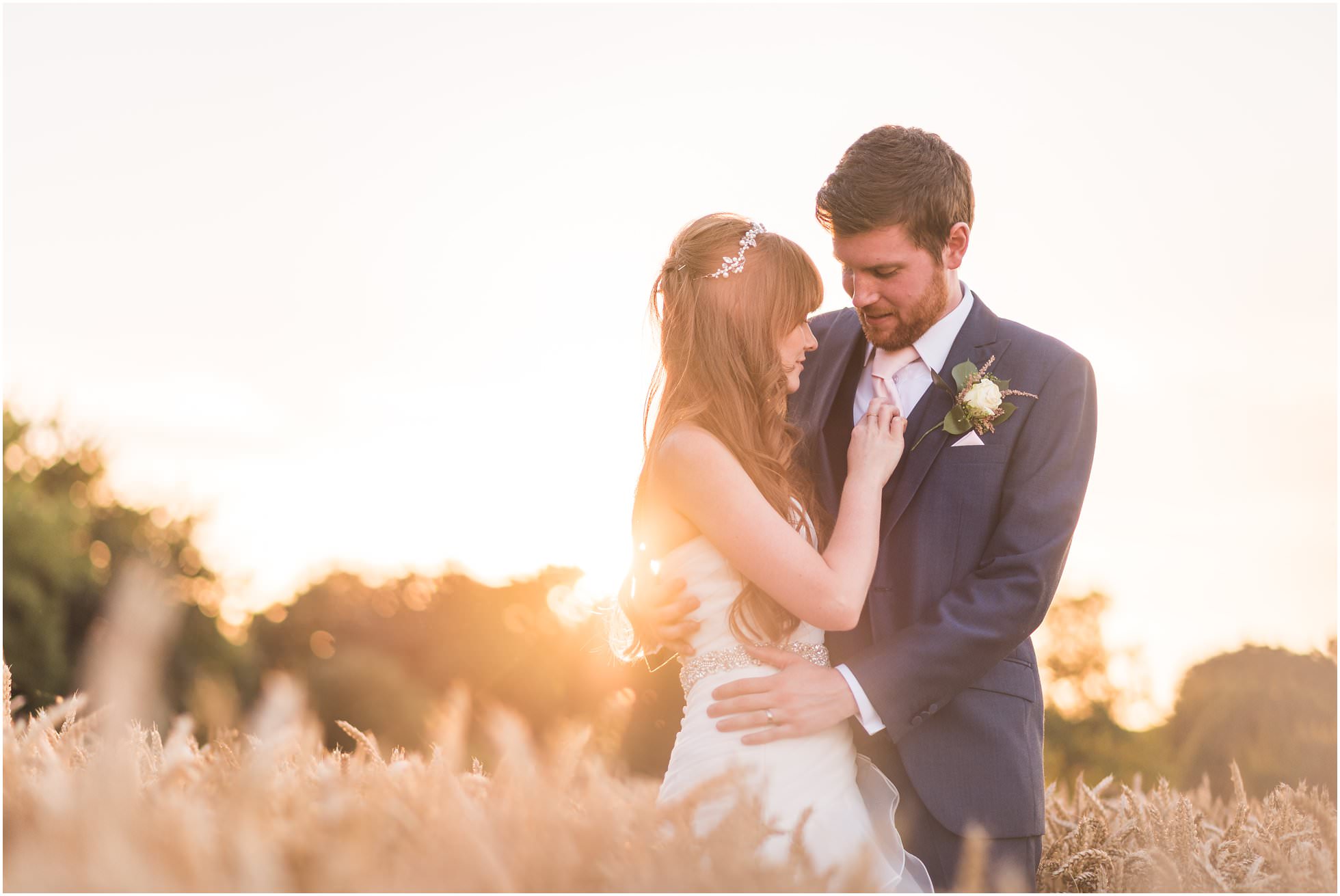Sunset cornfield wedding shot