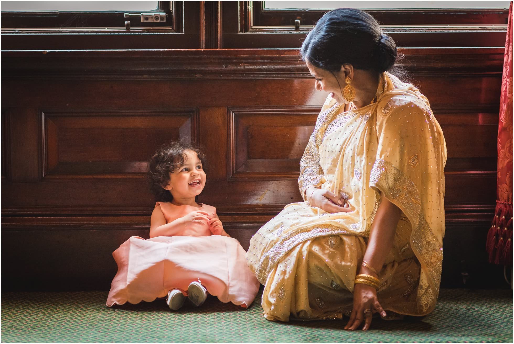 Grandma and granddaughter enjoying each other's company at a wedding at One Whitehall Place, London