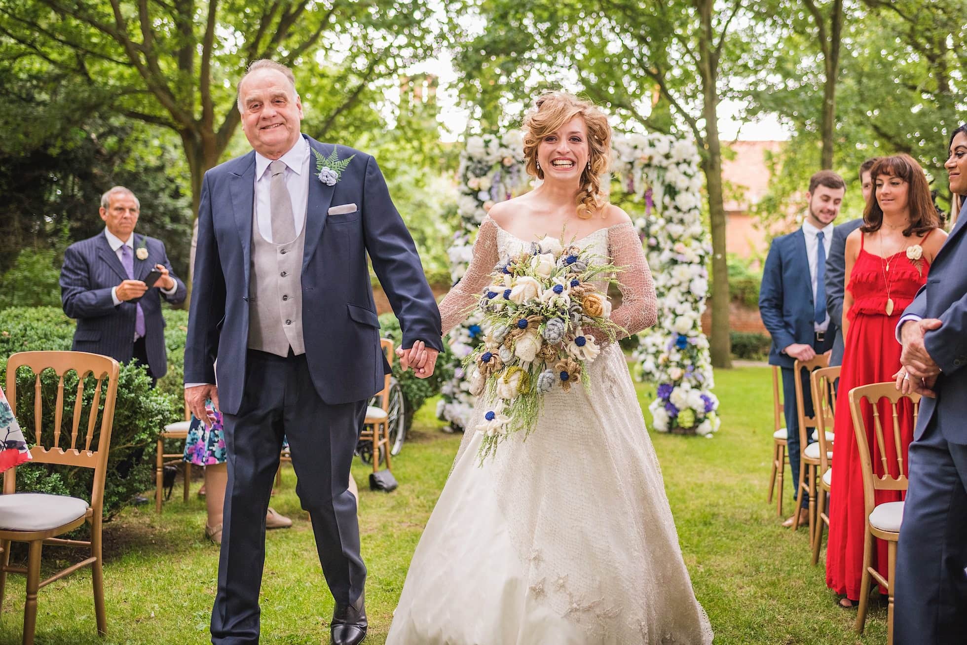 Walking down the aisle at Creeksea Place, Burnham on Crouch