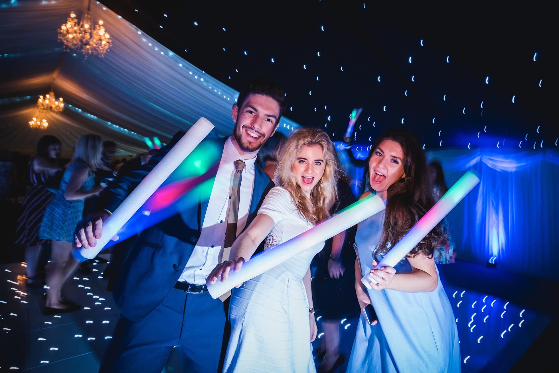 Glow sticks on the dancefloor