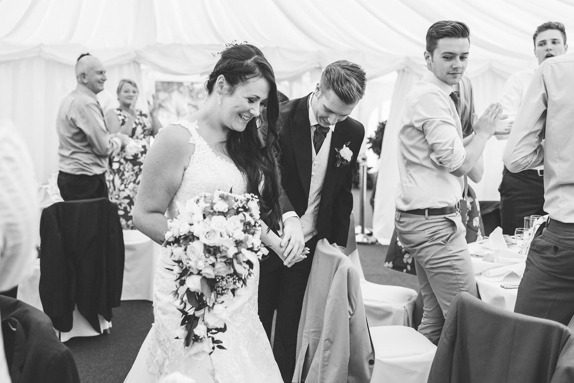 Standing ovation for bride and groom