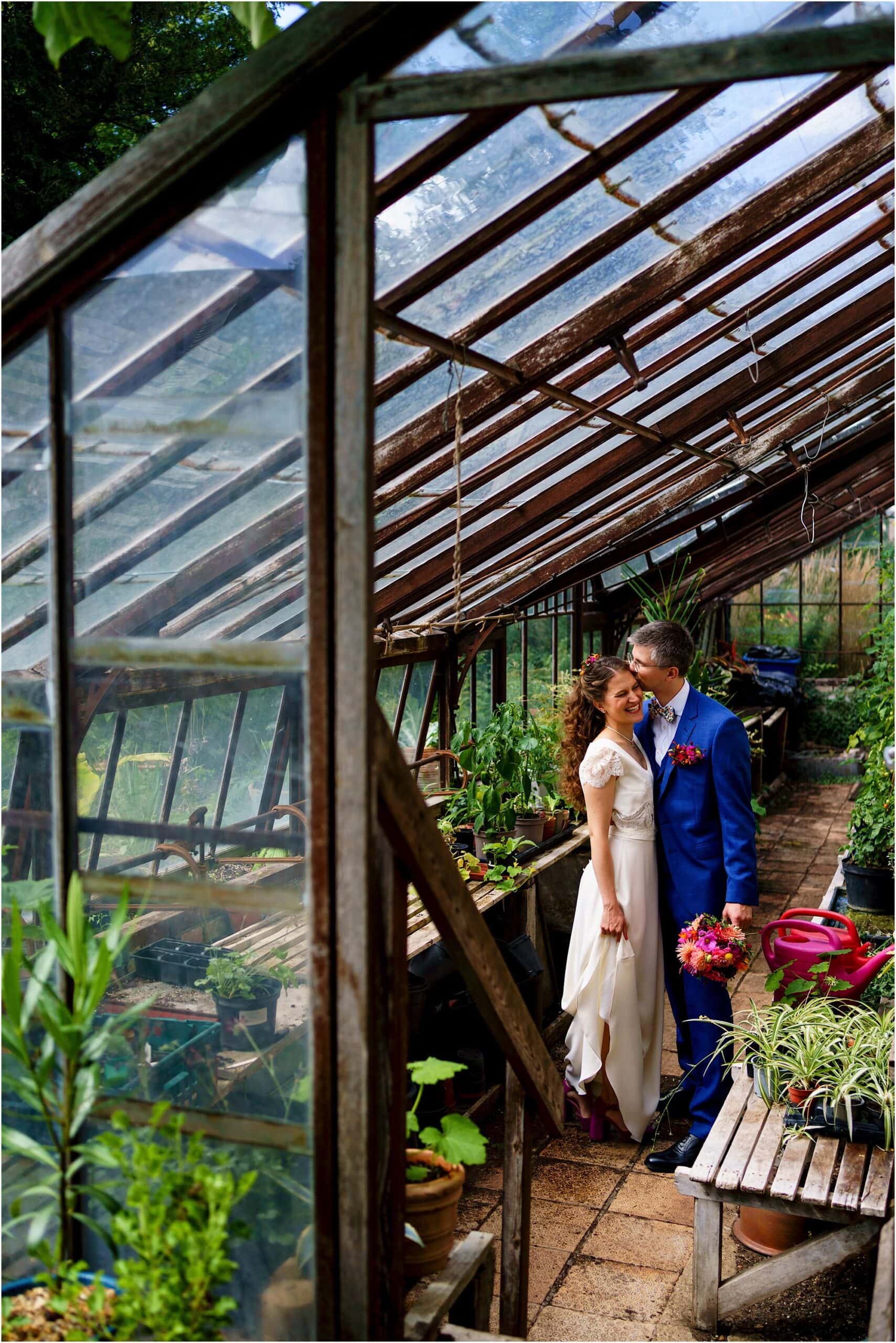 Wedding couple in greenhouse
