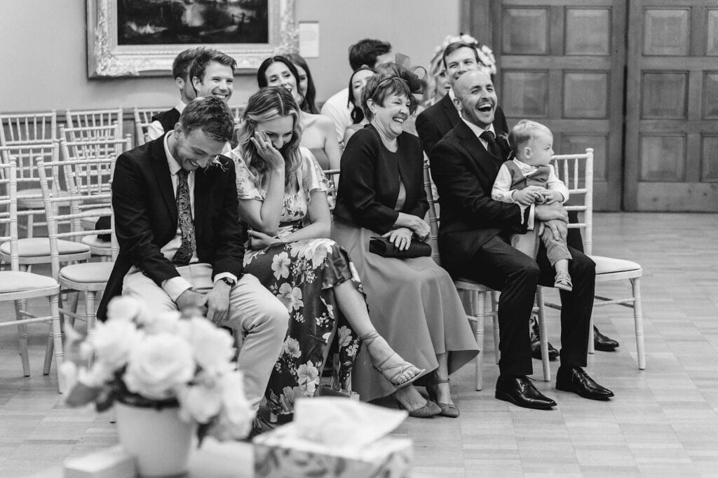 Guests in tears of laughter at a Norwich Castle Wedding