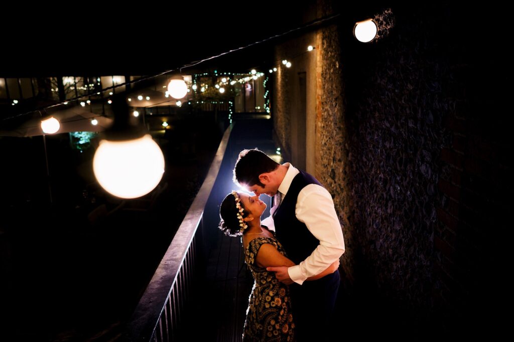 Romantic photo of couple under lanterns