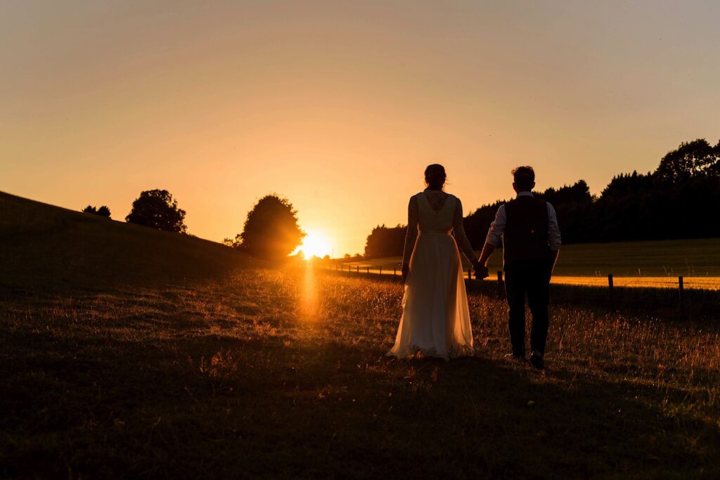 Couple walking into the sunset