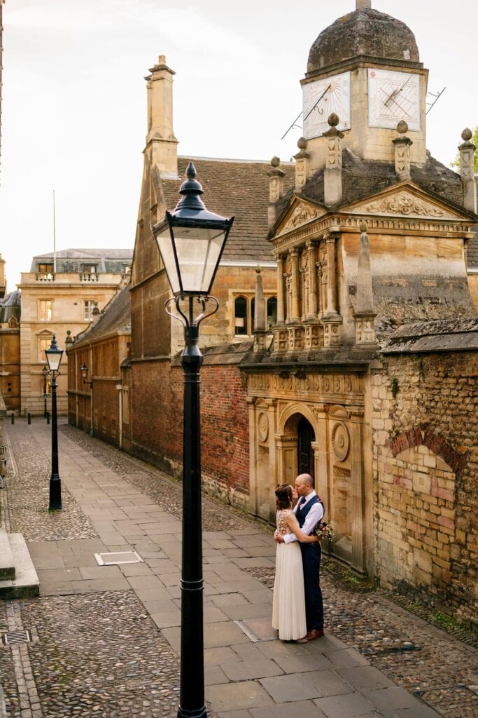 Wedding couple kissing in Cambridge