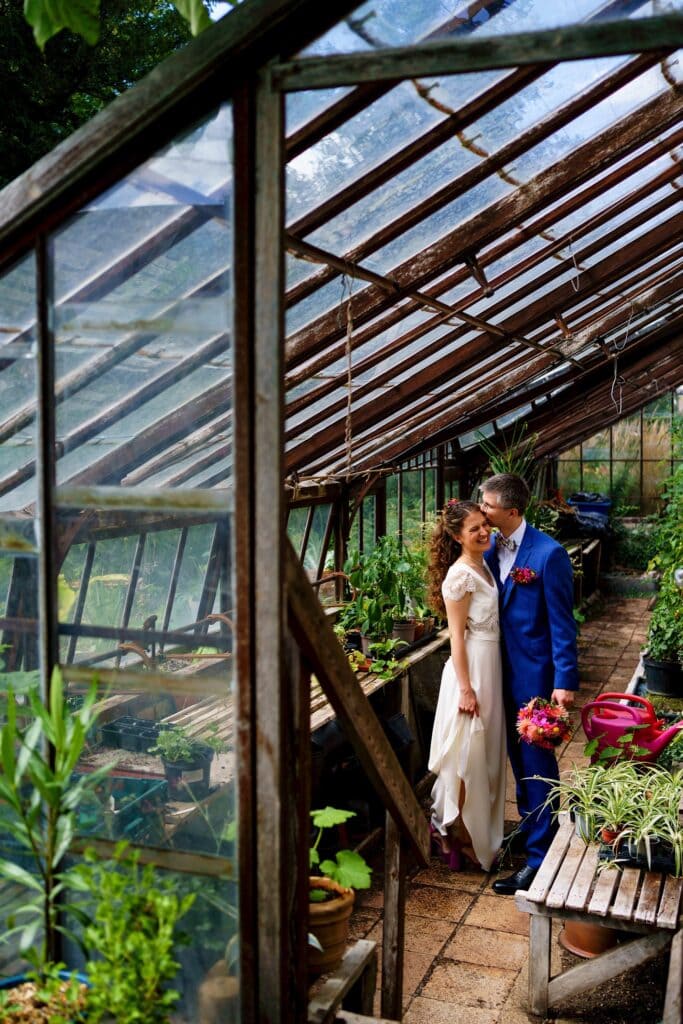 Wedding couple in a greenhouse