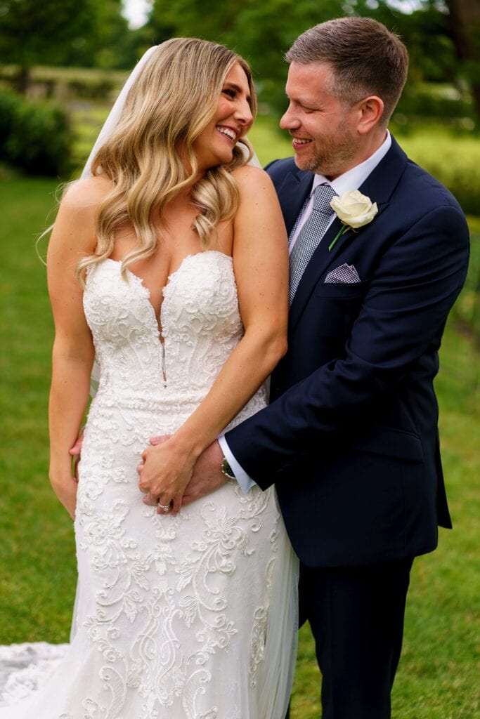 Beautiful bride smiling at her husband