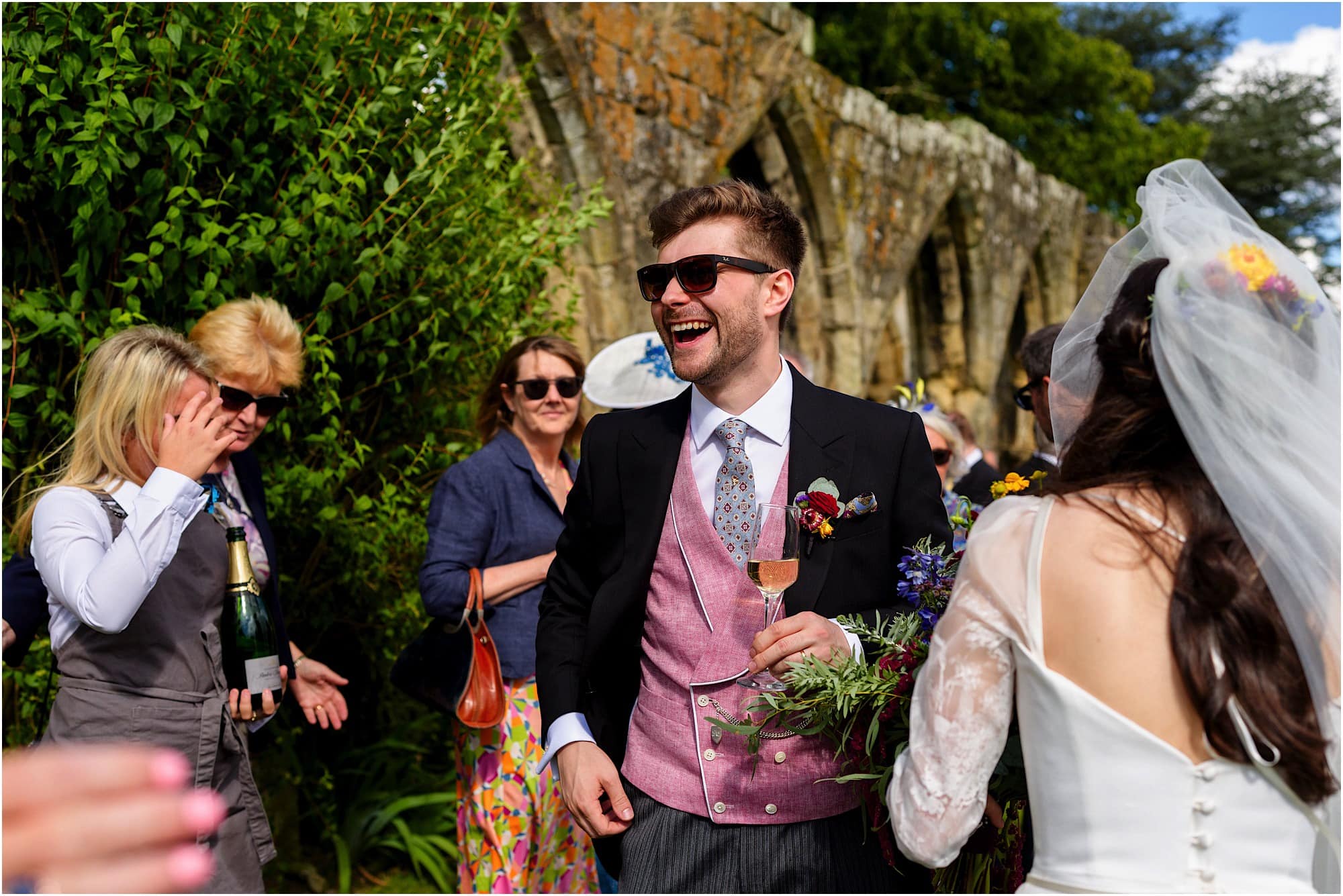 Groom laughing