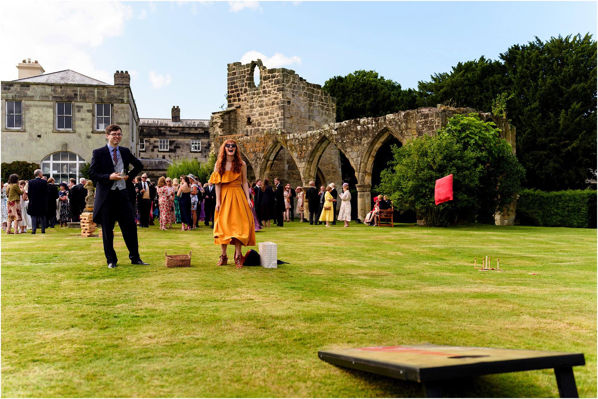 Corn dog garden game in front of the ruins