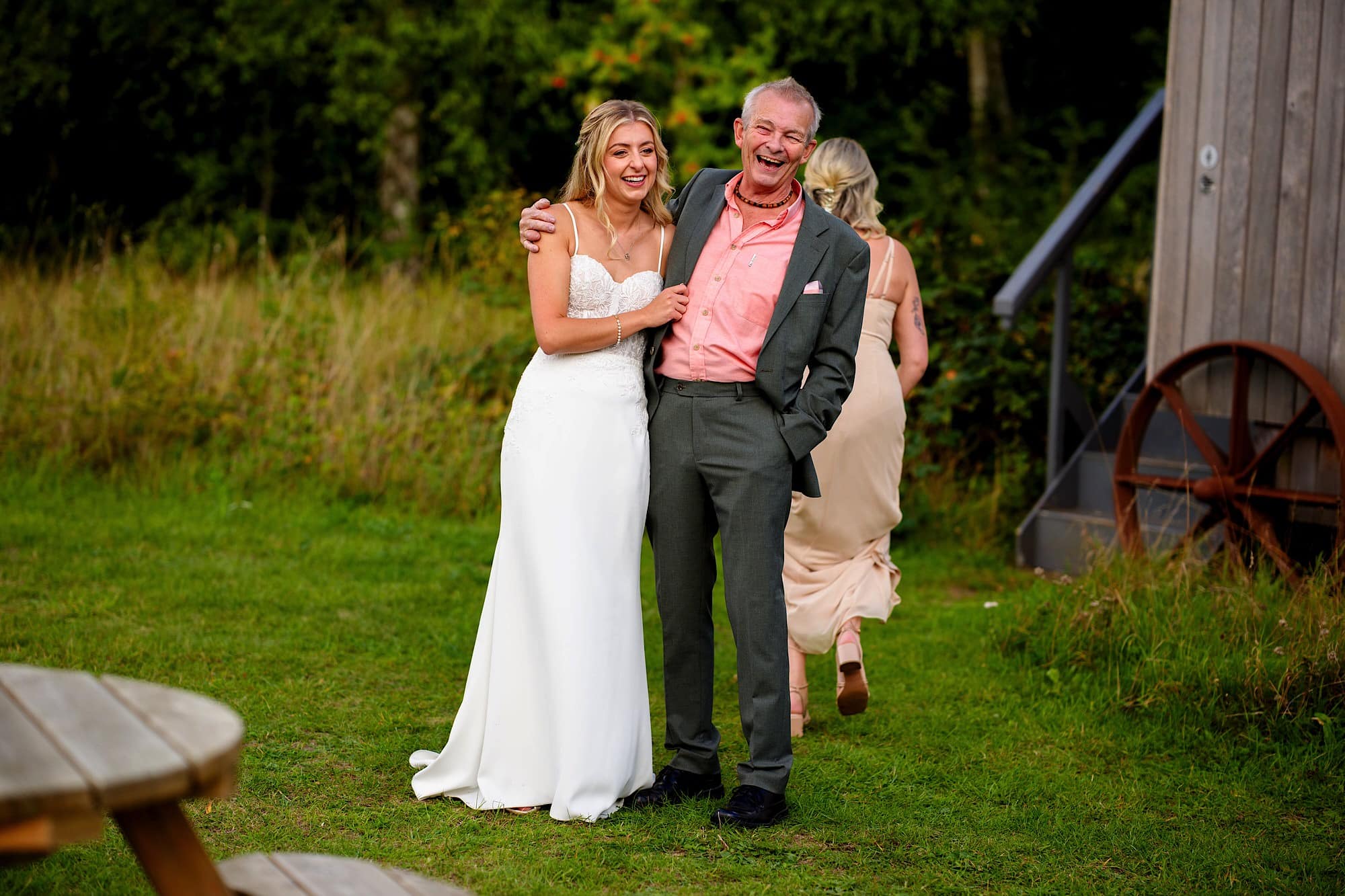 bride with uncle laughing