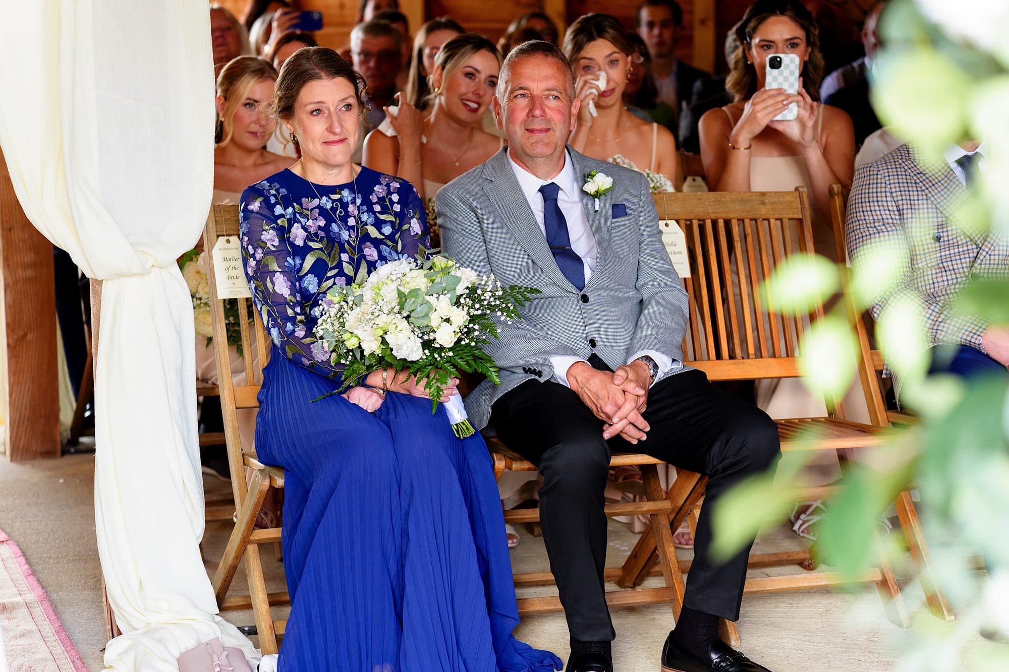 Mother and father of the bride getting emotional during the ceremony