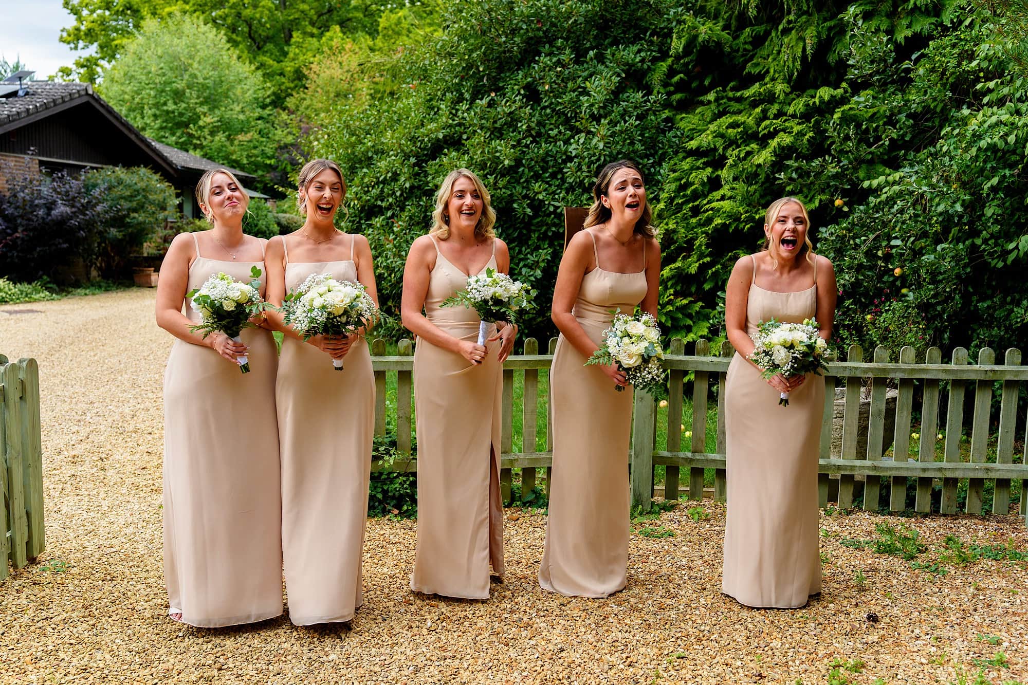 Bridesmaids reaction to bride in wedding dress