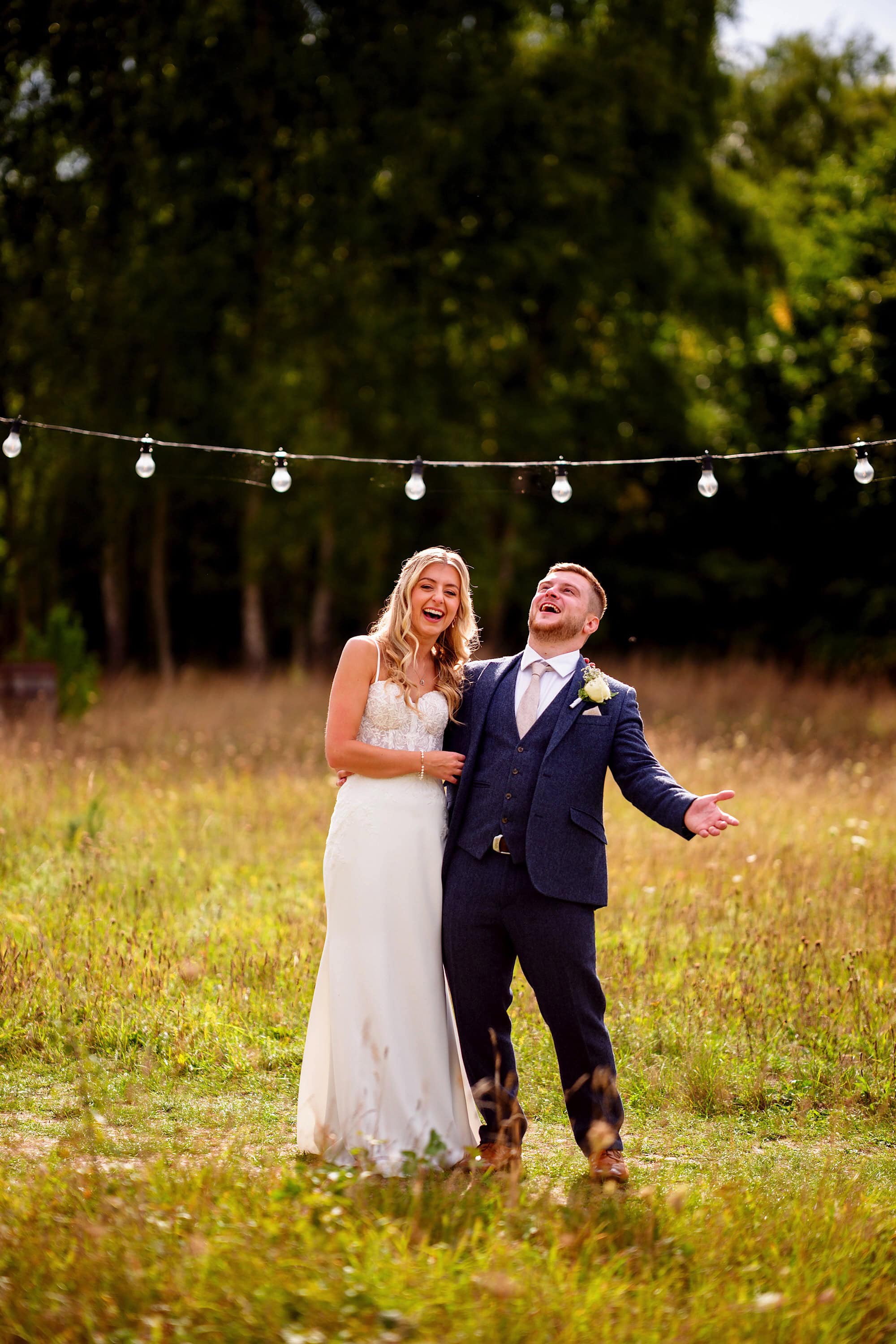 bride and groom laughing during couple photos