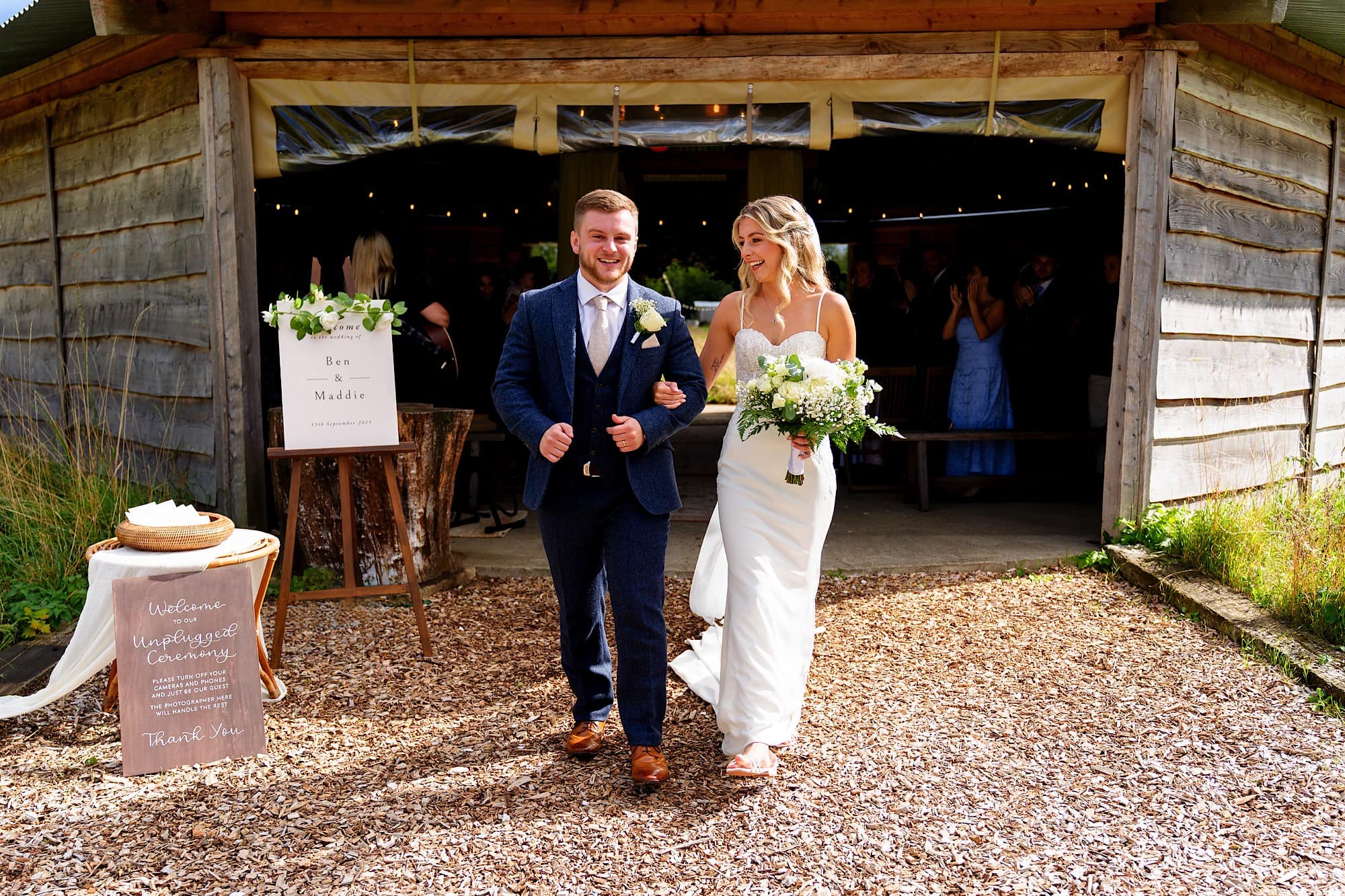 bride and groom leaving the ceremony
