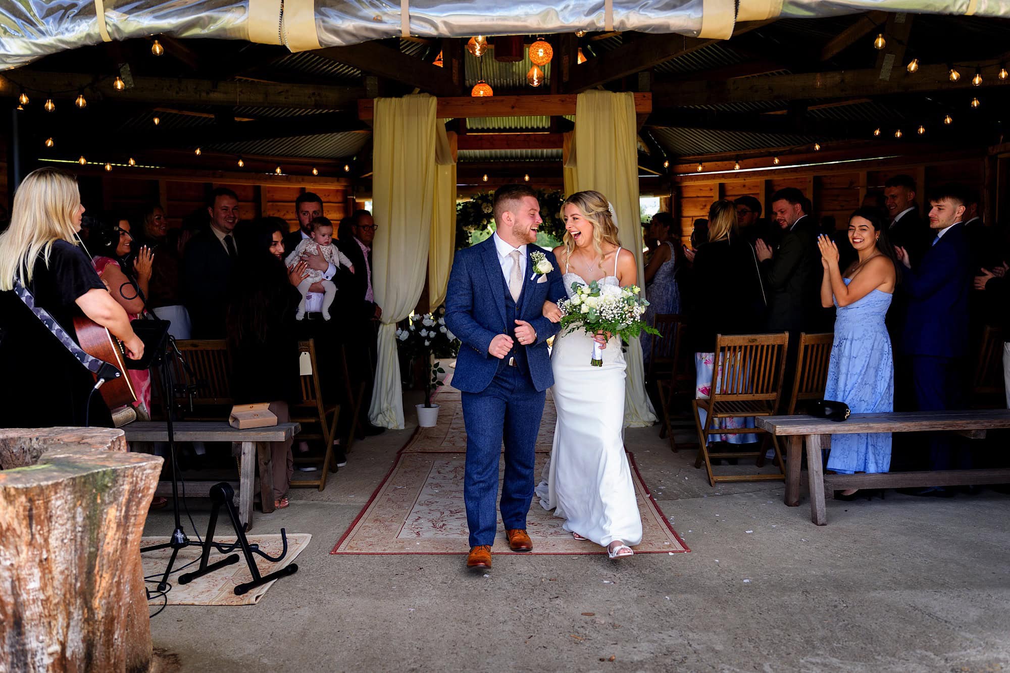 leaving the ceremony smiling with joy