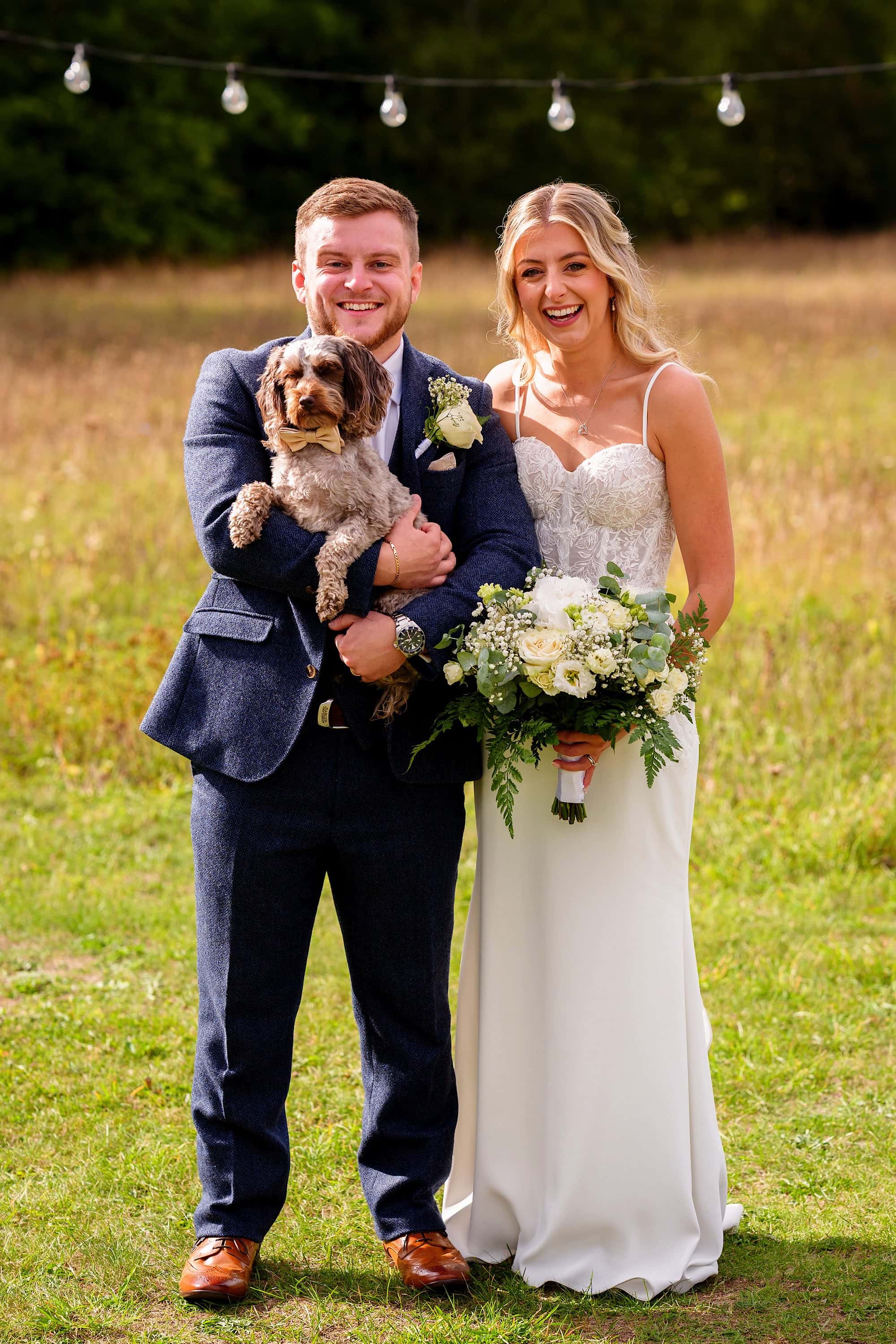 portrait of couple with their dog