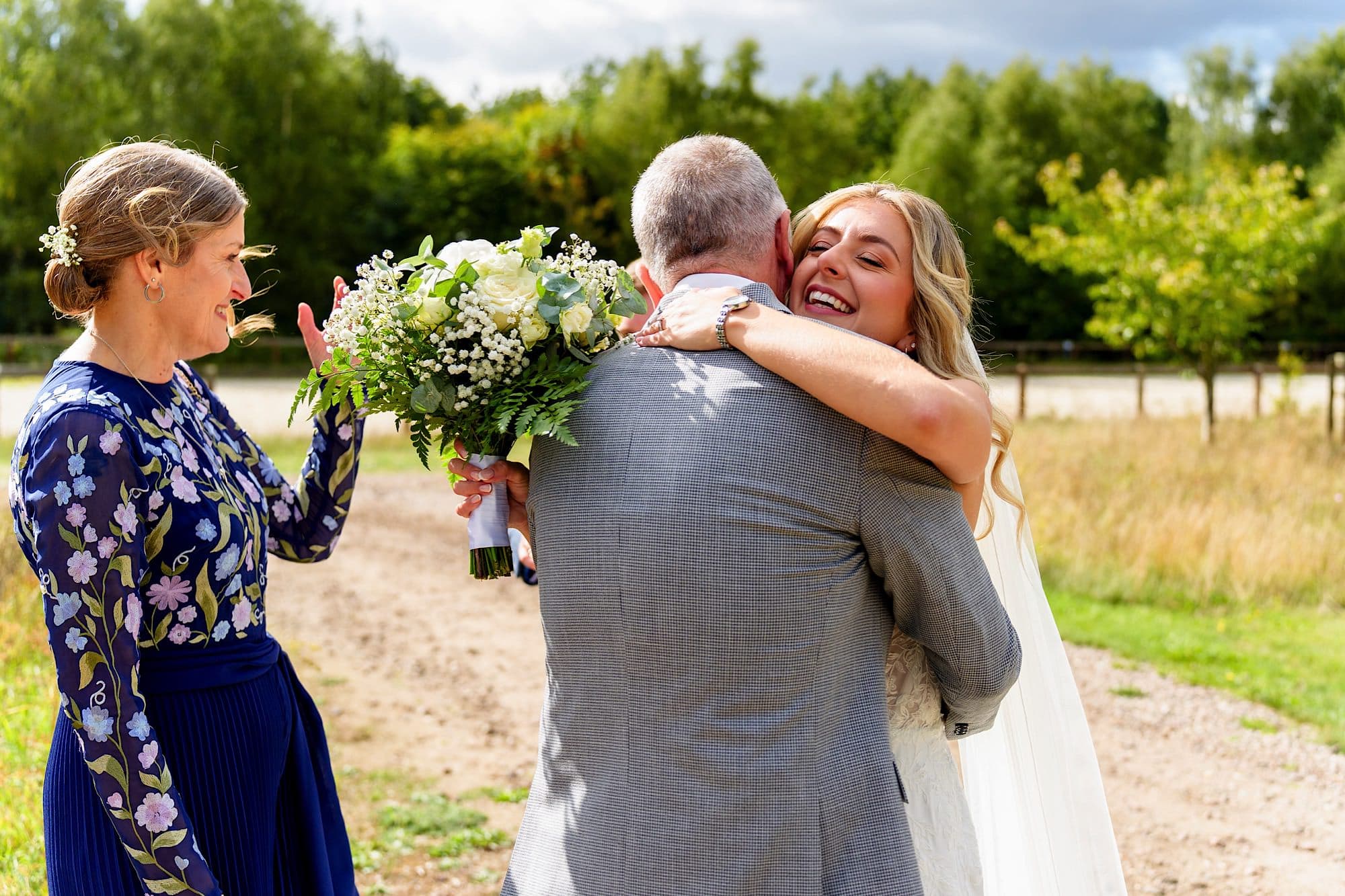 bride hugging her dad
